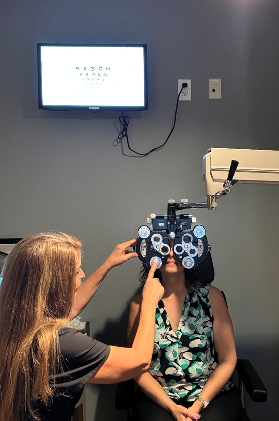 world sight day 2025 2 patient-having-eyes-refracted-by-optometrist-Dr-Galluzo-at-Fort-Lauderdale-Eye-Institute